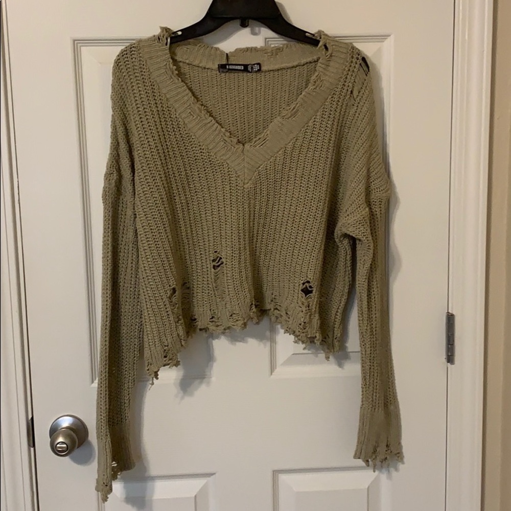 Distressed oversized crop sweater